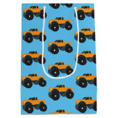 モンスタートラック車オレンジブルー ミディアムペーパーバッグ (裏面)