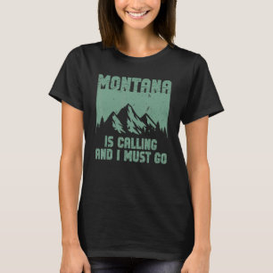 モンタナに電話して、モンタナ山に行かねばならない Tシャツ