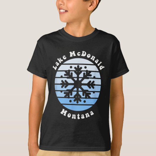 モンタナ州マクドナルド湖の雪片クリスマス冬S Tシャツ (正面)