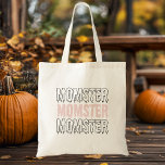 モースターピンクのハロウィン不気味かわいい&かわいい！」 トートバッグ<br><div class="desc">私運たちの「モスター」ピンクのハロウィーンのトートバッグとスタイルであなたのハロウィーンの必需品！ユーモアのtouchで不気味な季節を受け入れるのが好きなママに最適な、このトートバッグよくはしゃぐは、ピンクの背景に不気味なレタリングにはっきりしたは「モスター」のデザインを備え鮮やかている。あなたはのトリックや子供との治療、ハローウィンパーティに向かう、または単にの用事に向かうかどうか、この耐久性とトートスタイリッシュは、シーズンのための完璧なアクセサリーである。可愛くて不気味な運バッグでハロウィーンの精神とグッズを見せびらかせ！</div>