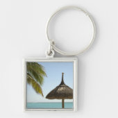モーリシャス。アンブレラ付きのアイデリックビーチのシーン キーホルダー (正面)