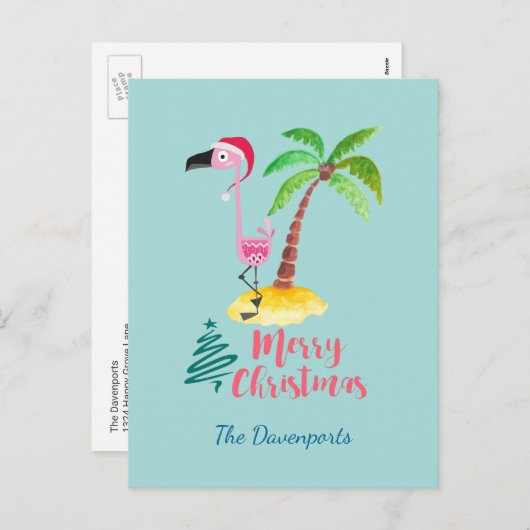 ヤシの木に挟まれたサンタハットのピンクのフラミンゴ シーズンポストカード (正面/裏面)