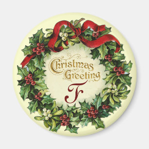 ヤドリギおよびヒイラギの果実が付いているクリスマスの王冠 マグネット