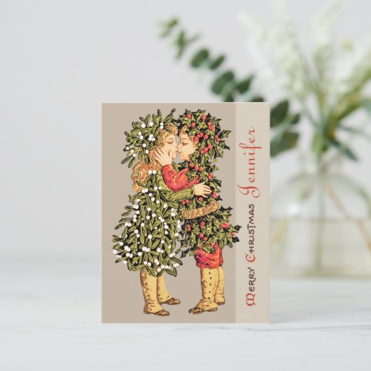 ヤドリギの女の子とホリーの男の子のキスCC0781クリスマス シーズンポストカード (スタンド正面)