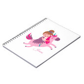 ユニコーンに乗るかわいいブロンドの髪の少女 ノートブック (左側)