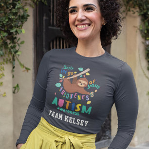 ユニークな自閉症のママチームにしがみつく Tシャツ