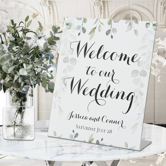 ユーカリの緑のつる植物は私たちの結婚の 台座サイン