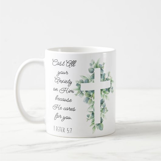 ユーカリ・クロスに全ての不安を投げ掛ける コーヒーマグカップ (左)