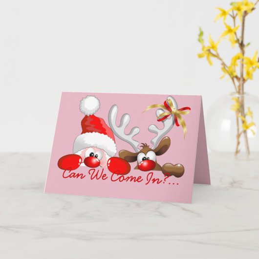 ユーモアあふれるクリスマスのサンタとトナカイの漫画 カード (黄色い花)