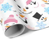 ユーモアあふれる雪だるまの顔と雪の結晶のパターン ラッピングペーパー (ロールコーナー)