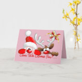 ユーモアたっぷりのクリスマス サンタとトナカイの漫画 カード (黄色い花)