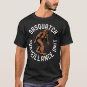 ユーモラスなビッグフット・サスカッチ監視ユニット・クリプティッド Tシャツ (正面)