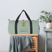 ヨガのポーズが緑とオレンジのスワールで囲まれた名前のスローガン レトロ ダッフルバッグ