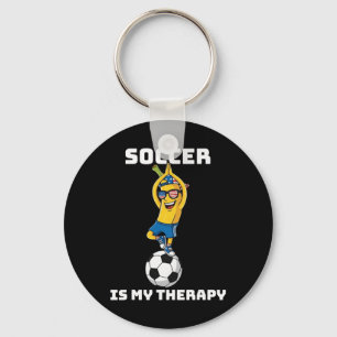 ヨガをする愛国バナナ サッカーは私のセラピー キーホルダー