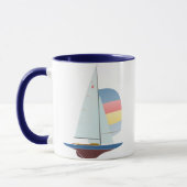 ヨットを競争させるドラゴンのクラス マグカップ (左)