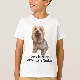 ヨークシャテリアのそうかわいい子供のユニセックスなワイシャツ Tシャツ
