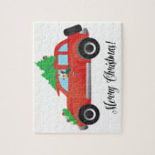 ヨークシャーテリアのテリア犬がクリスマスカーを運転 ジグソーパズル (縦)