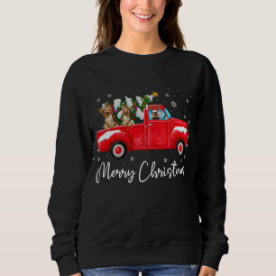 ヨークシャーテリアレッドトラッククリスマスサンタハットドッグクリスマス スウェットシャツ