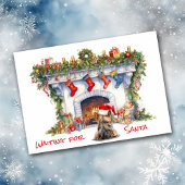 ヨークシャーテリア犬がサンタ・クリスマス暖炉を待つ