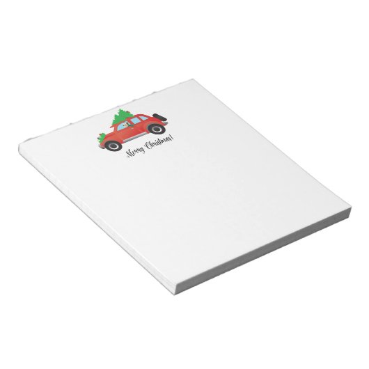 ヨークシャーテリア・テリア犬がクリスマスカーを運転 ノートパッド (アングル)