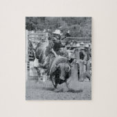 ライダぶら下がったーが牛をバクする ジグソーパズル (縦)