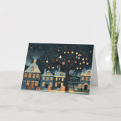 ライトアップされたクリスマスツリーと雪の多い家 カード (正面)