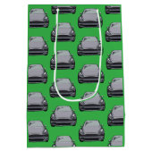 ライトグレー電気自動車SUV車のグリーンバックグラウンド ミディアムペーパーバッグ (裏面)