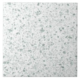 ライトセージ緑の上の白いテラゾーストーンパターン タイル