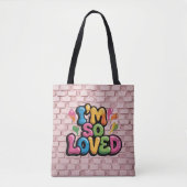 ライトピンクのレンガの"I'm So Loved"落書きタグ トートバッグ (正面)