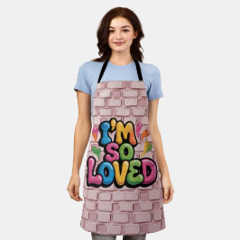 ライトピンクのレンガの"I'm So Loved Graffiti"タグ エプロン