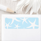 ライトブルーのヒトデの白い模様。 ラベル (インサイチュ)