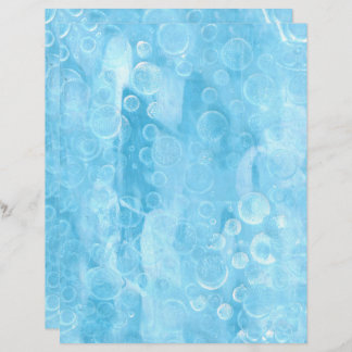 ライトブルーの紙シート上の円と球