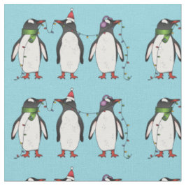 ライトブルーの背景の3羽のクリスマス・ペンギン ファブリック