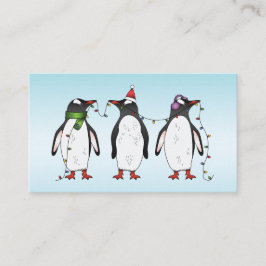 ライトブルーの背景の3羽のクリスマス・ペンギン 名刺