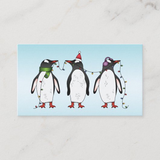 ライトブルーの背景の3羽のクリスマス・ペンギン 名刺 (正面)