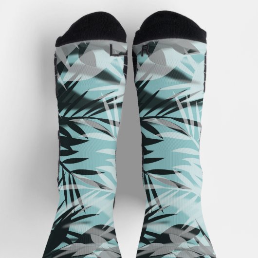 ライトブルーの黒い熱帯パターン ソックス (上部)