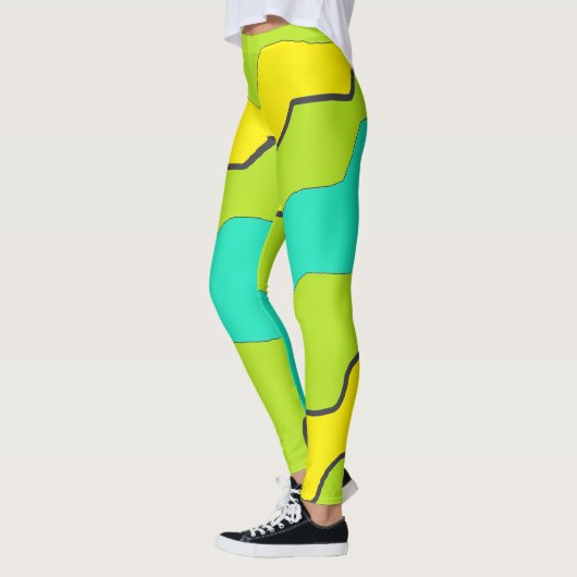 ライムグリーン、ティール（緑がかった色）、およびイエローレギンス レギンス (左)