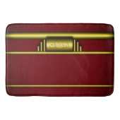 ラグジュアリーな金ゴールドとマルーンのアートデコモノグラム バスマット (正面)