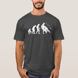 ラグビーの進化のおもしろいな洞窟人のタックル Tシャツ