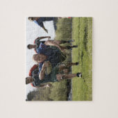 ラグビー選手がボールでグラウンドにジャンプする得点 ジグソーパズル (縦)