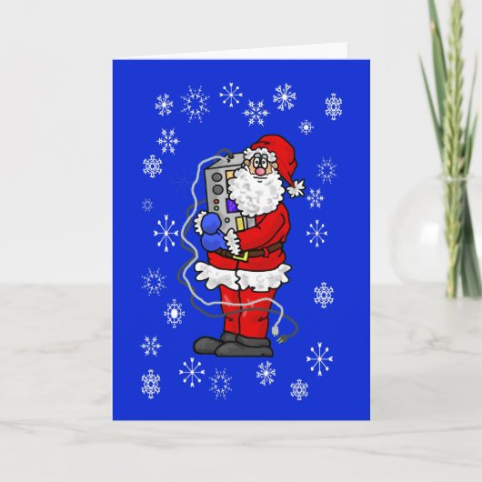 ラジオのクリスマスカードを抱きしめるサンタ カード (正面)