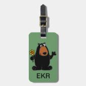 ラッパスイセンの漫画を持つかわいいツキノワグマ ラゲッジタグ (正面縦)