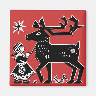 ラップランドの少女がトナカイのクリスマス磁石を持つ マグネット