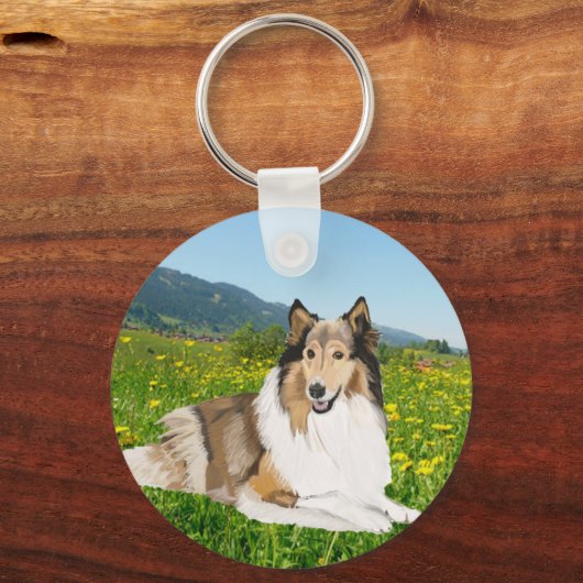 ラフ・コリーはバターカップの牧草地に対して。 キーホルダー (正面)