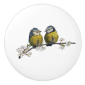 ラブバードは白いさくらんぼの花枝に座っている セラミックノブ (正面)