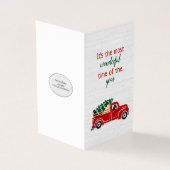 ラブラドール犬の赤いクリスマストラック (外部)