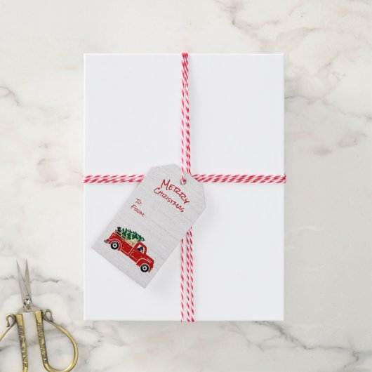 ラブラドール犬の赤いクリスマストラック ギフトタグ (より糸付き)