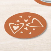 ラブリーなジオメトリー - 赤っぽい黄土色の背景にクリーム色 - 画像。 ラウンドペーパーコースター (アングル)