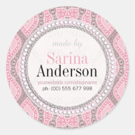 ラベルのろうけつ染めで作られた部族のピンクのパターン ラウンドシール
