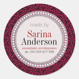 ラベルシールで作られた赤い黒の花柄 ラウンドシール